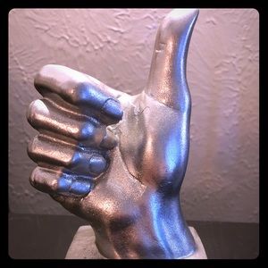 Quirky thumbs-up decor